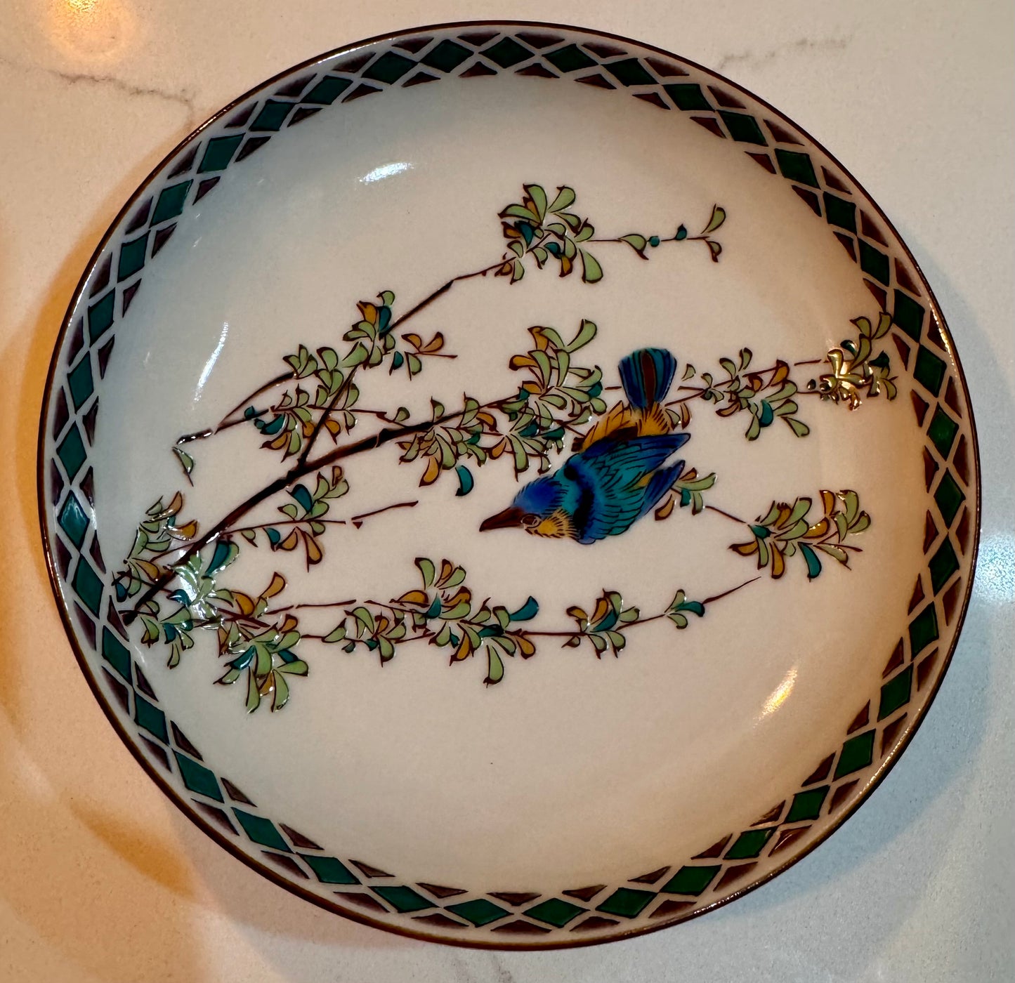 Resting Bird On Branch Plate